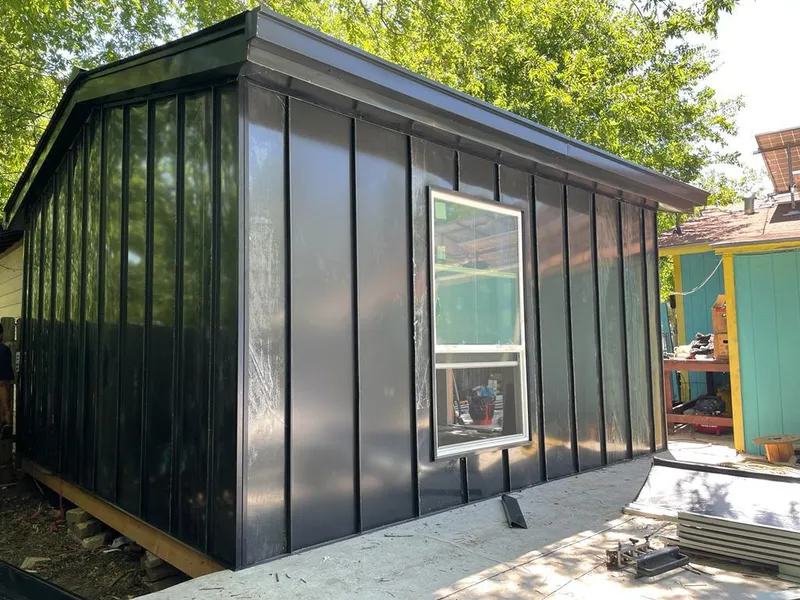 Black standing seam metal wall panels for Roof Inspection in Carolina Shores