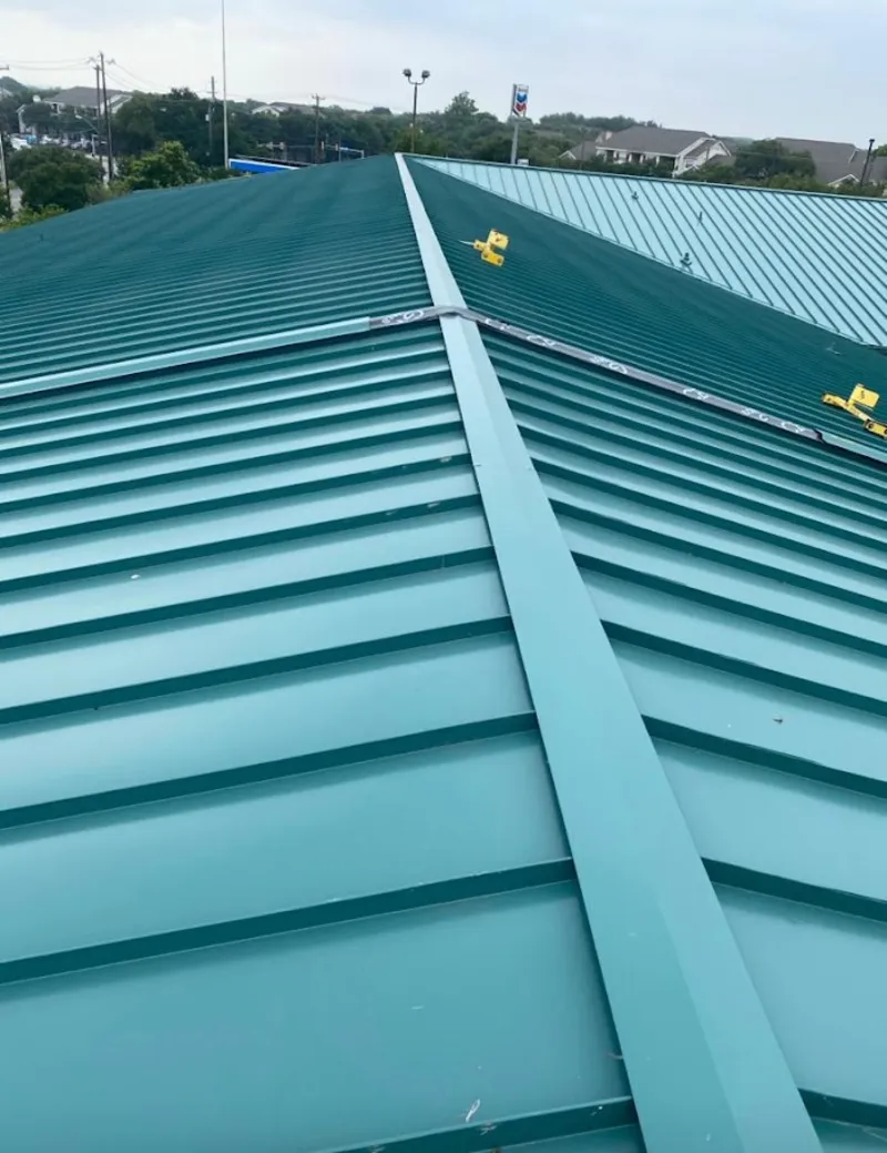 Green commercial metal roof ridge and valley for Metal Roof Repair in Carolina Shores